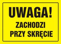 Tablica UWAGA! Zachodzi przy skręcie